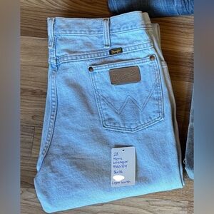 Men’s light wash Wranglers